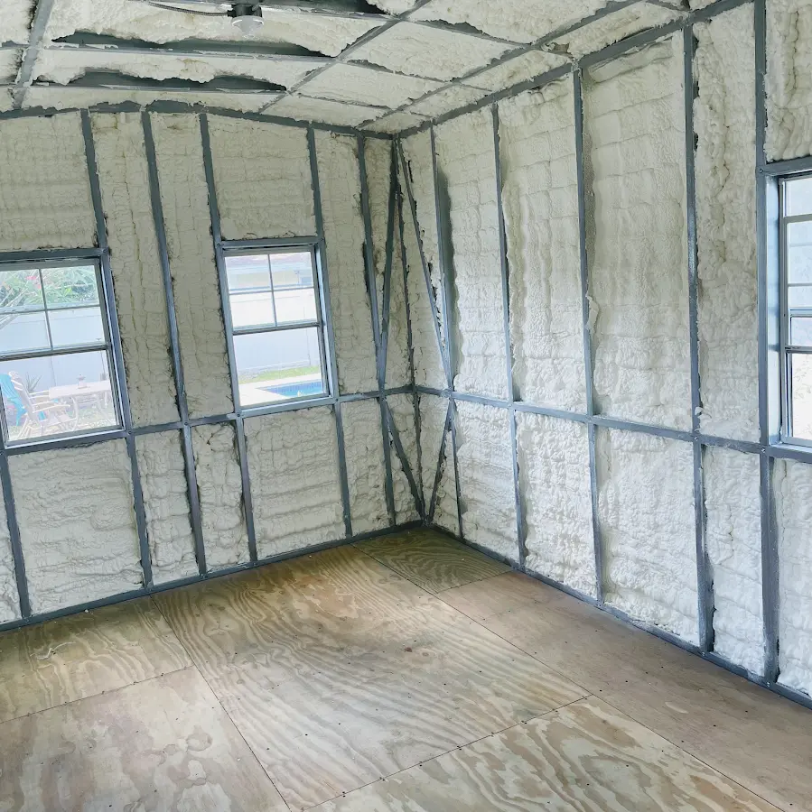 Closed-cell spray foam insulation applied to wall cavities in a residential project in Maysville